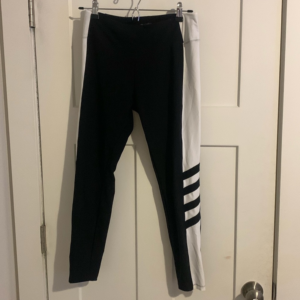 black leggings with white stripe down side